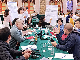 People discussing during a workshop.